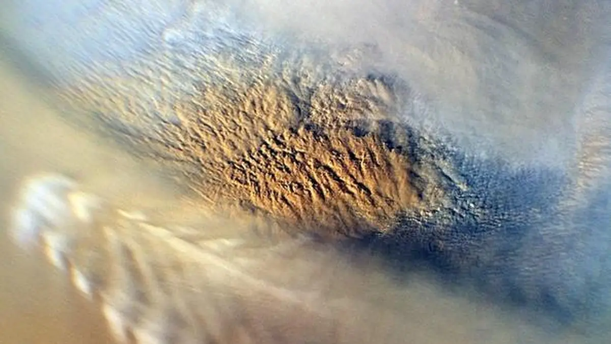 Martian Dust Storm — This close-up image of a dust storm on Mars was acquired by the Mars Color Imager instrument on NASA Mars Reconnaissance Orbiter on Nov. 7, 2007. This image is centered on Utopia Planitia.